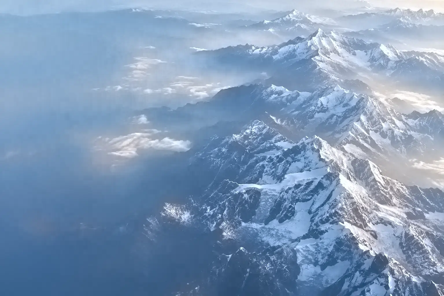 Himalayan ridges seen from above at blue hour